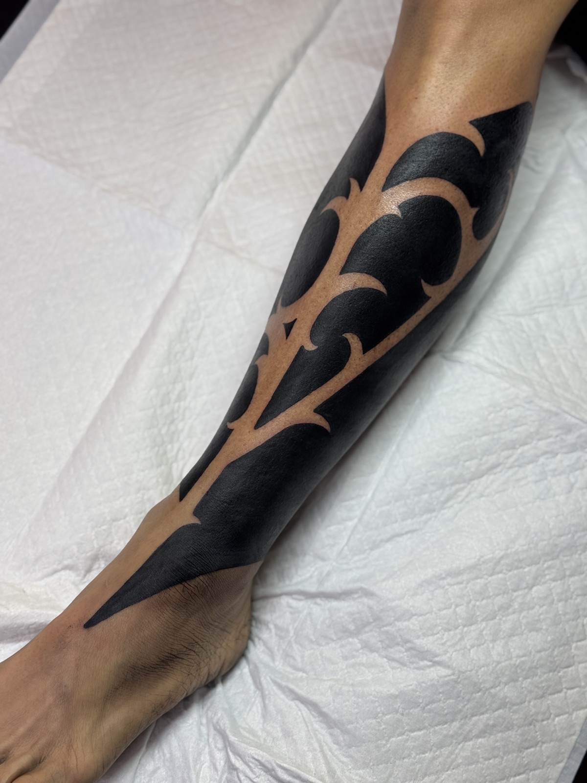 Solid blackout cover-up with negative-space design